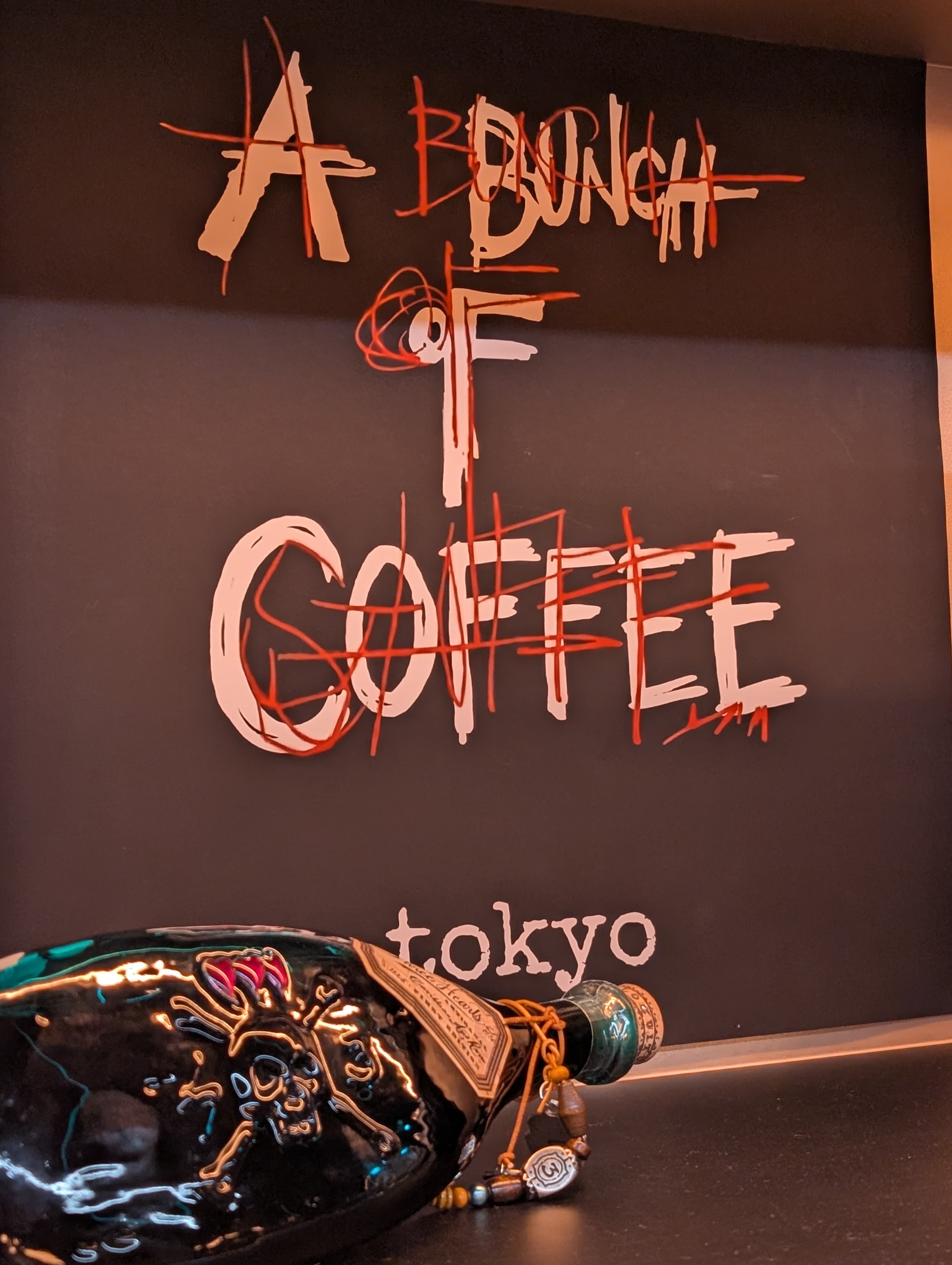 A Bunch Of Coffee logo wall at the Tokyo bar