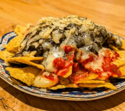 Loaded nachos with black curry and melted cheese at A Bunch of Coffee Tokyo