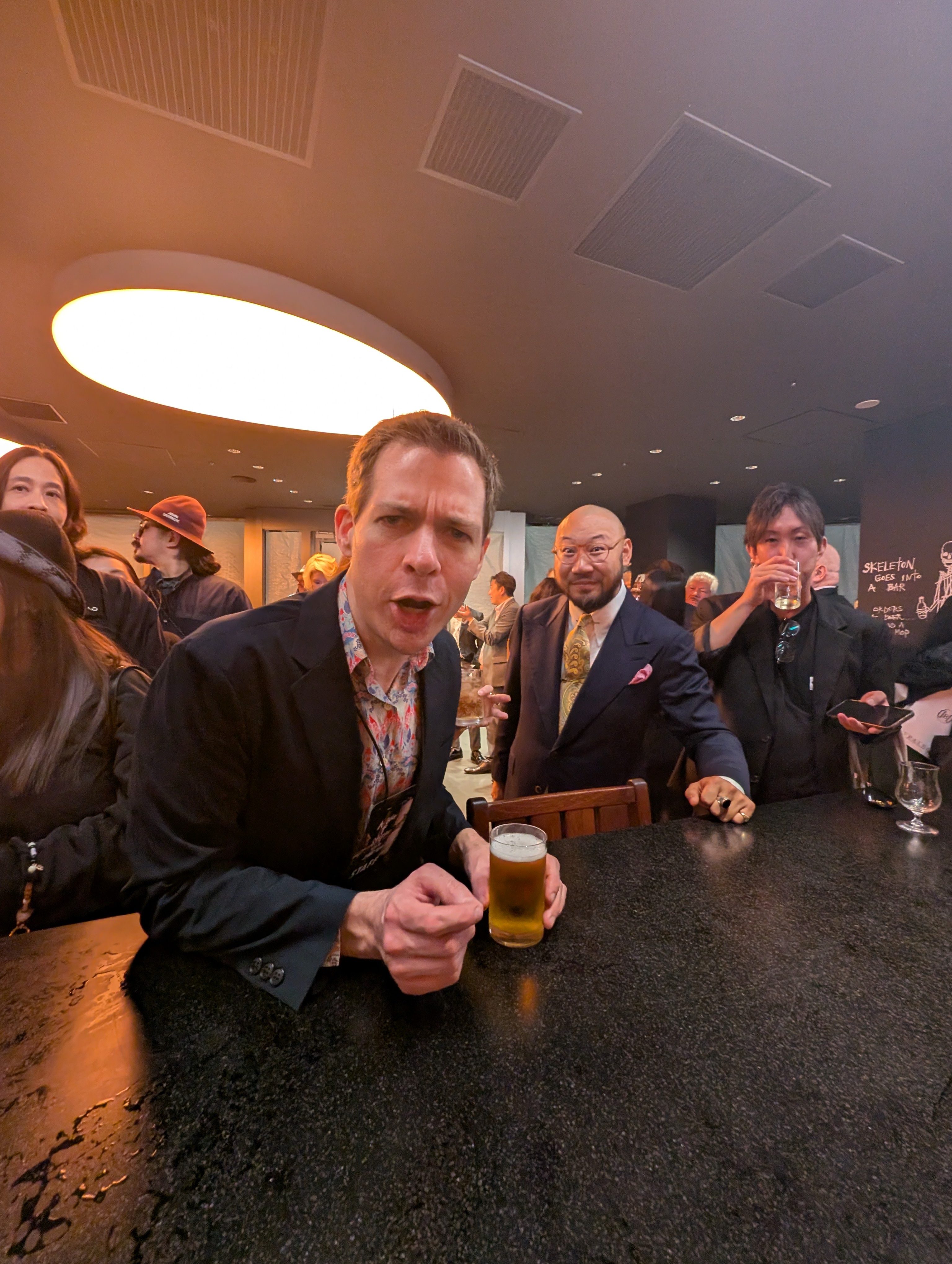 Bar patrons enjoying drinks and socializing at A Bunch of Coffee Tokyo