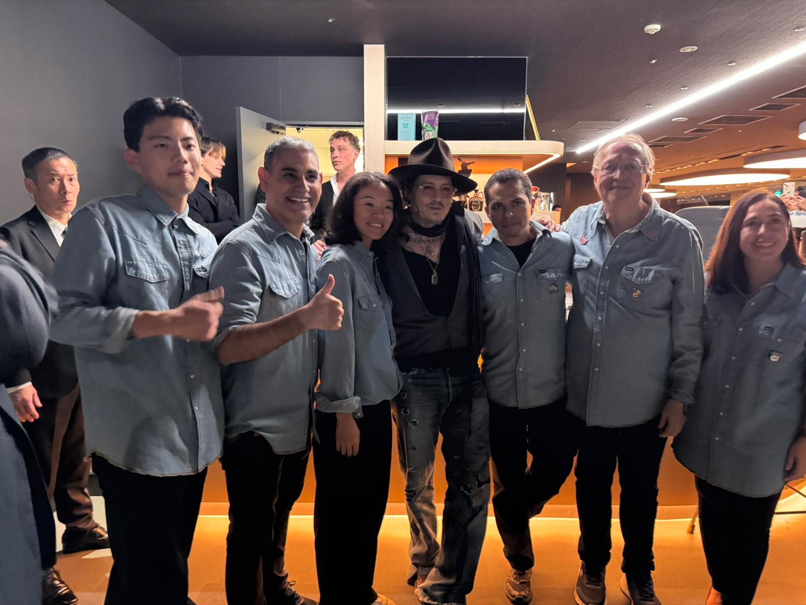 A Bunch of Coffee staff team with special guest at Tokyo cafe